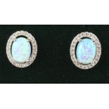 Pair of halo set opal dress ear-rings stamped 925 Condition Report <a