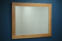 Light oak framed rectangular mirror with bevelled glass,
