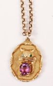 Pendant in the form of a cat set with amethyst and emeralds stamped 14k approx 11.