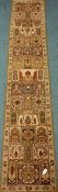 Persian design garden runner rug, green ground, decorated with Boteh motifs and peacocks,