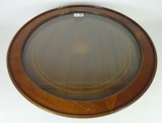 Edwardian mahogany and glazed Lazy-Susan, box wood stringing and sand etched shell motif to centre,