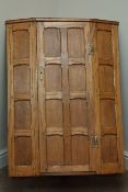Panelled oak wall hanging corner cabinet, single door, W65cm,