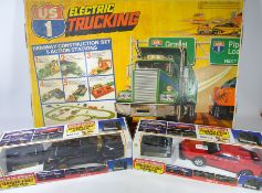 Vintage Tyco Electric Trucking set and two 'Grand Prix Series' Ferrari and Porsche remote
