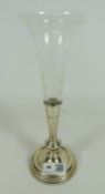 Cut glass trumpet vase with hallmarked silver base with etched glass liner,