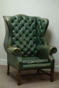 20th century Georgian style wingback armchair,