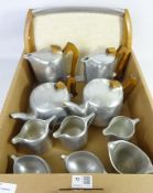 Two Picquot ware four piece tea and coffee services and one tray in one box Condition