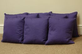 Eight purple cover traditional duck feather lined cushions,