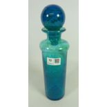 Mdina Maltese green/blue glass cylinder bottle and stopper, signed to base, H29.