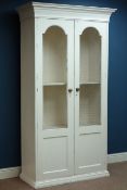 White painted kitchen larder cupboard, arched wire and panelled doors, W105cm, H197cm,