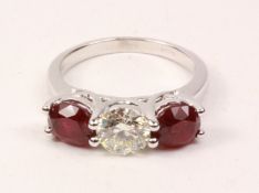 Three stone brilliant cut diamond and ruby white gold ring hallmarked 18ct (diamond approx 1 carat