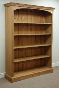 Large waxed pine open five tier bookcase, W138cm, H183cm,