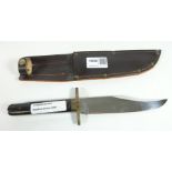 Venture Bowie knife with horn type handle, brass guard and steel blade,