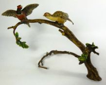 Cold painted bronze model of a pair of pheasants on a branch,