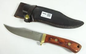 Irish knife hand made by Rory Conner with wooden grip and steel blade in leather sheath, No.