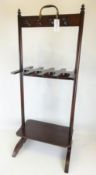 20th century mahogany hunting boot and whip stand with brass handle and turned finials H112cm