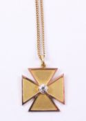 Diamond set Maltese cross pendant stamped 15c approx. 4gm on chain necklace stamped 9ct approx.