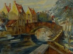 Canal Running Through a Town, watercolour signed and dated J Lucas 1933,
