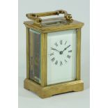 Late 20th century French brass Carriage timepiece, white dial in reeded case,