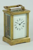 Late 20th century French brass Carriage timepiece, white dial in reeded case,