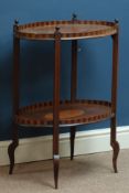 Edwardian mahogany oval two tier occasional table, with satinwood shell inlays, 58cm x 41cm,