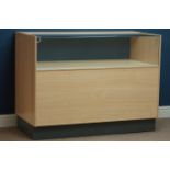 Light beech finish and glazed shops display unit with open back, W121cm, H91cm,