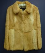 Short blonde Rabbit fur jacket