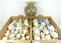 Collection of early 20th Century and later decorative teapots and a Oriental vase in two boxes