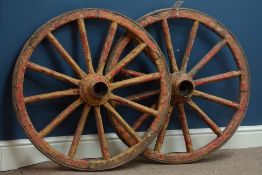 Pair 19th century wooden and metal bound cart wheels,