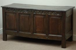 Early 18th century panelled oak kist, carved frieze, hinged lid, W136cm, H70cm,