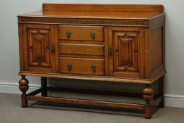 Early 20th century oak sideboard two cupboards with panelled doors,