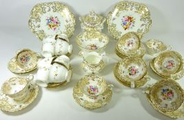 Early 19th Century Coalport tea and coffee service hand painted with flowers and insects within