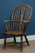 Early 19th century elm and ash Windsor armchair, double hoop stick and pieced splat,