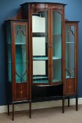 Edwardian inlaid mahogany glazed display cabinet, break bow front with mirrored back, W125cm,