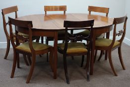Regency style mahogany and satinwood banded dining table, two D-ends and leaf (113cm x 163cm,