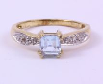 Gold princess cut aquamarine ring with diamond shoulders hallmarked 9ct Condition Report