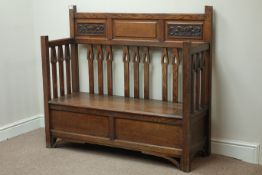 Early 20th century Arts & Crafts hall bench, carved fielded panels, hinged seat enclosing storage,