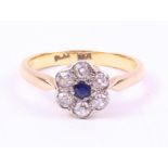 Diamond and sapphire flower set ring stamped 18ct plat size M Condition Report