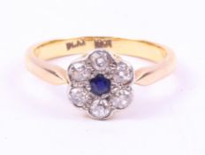 Diamond and sapphire flower set ring stamped 18ct plat size M Condition Report