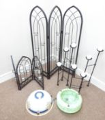 Three decorative metal candle stands,