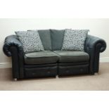 Two seat Chesterfield sofa upholstered in faux leather, contrast scatter cushions,