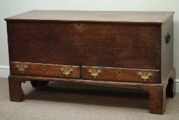 Late 18th century oak mule chest, hinged lid, two drawers, on tall bracket feet, W138cm, H75cm,