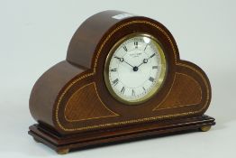 Early 20th century inlaid mahogany arched top mantle clock circular dial inscribed 'Dyson & Son