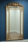 Large rectangular wall mirror in ornate gilt cushion frame with pediment, W92cm,