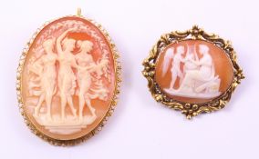 Oval shell cameo brooch/pendant carved with dancing muses the surround stamped 750 and a similar
