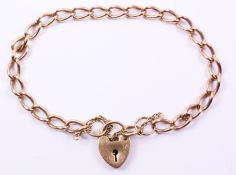 Gold curb chain bracelet hallmarked 9ct with hallmarked gold padlock approx 13.