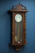 Late 19th century walnut Vienna wall clock with circular dial, twin weight movement,
