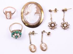 Edwardian oval cameo brooch and a pair of earrings both stamped 9ct,