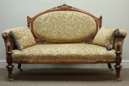 Late Victorian walnut two seat settee, with carved cresting, cameo back and curved arms,