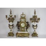 20th century gilt metal & marble clock garniture, circular dial set with two fauns with a garland,