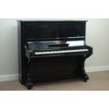 Steinway upright piano, iron framed overstrung movement with under damper & check tape,